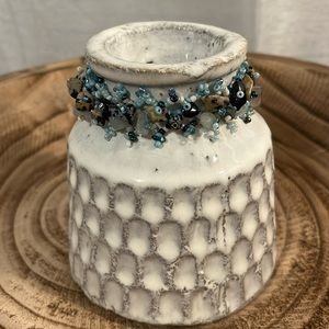 Beach style stretch bracelet.  Seed bead detail. Loop over bead ball closure.